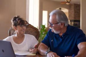 Elder couple discussing finances